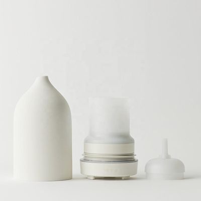 2021 Mejor vendedor 100 ml difusor de aroma cerámico de piedra ultrasónica con función de tiempo